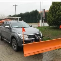 SNOW PLOW AND SALTING VEHICLE